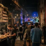 Lyon street food festival 2026 aux Grandes Locos : mains et plateaux street food, ambiance concert